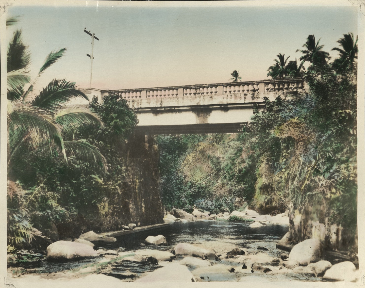 [Untitled – Bridge over a small Philippine river].