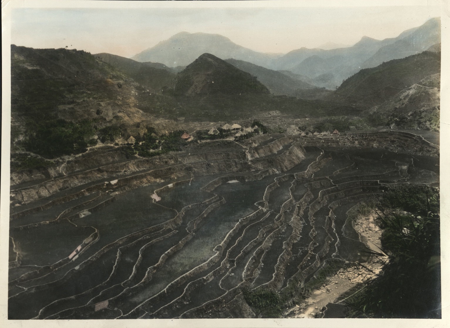 [Untitled – Village and rice terraces in mountainous territory].