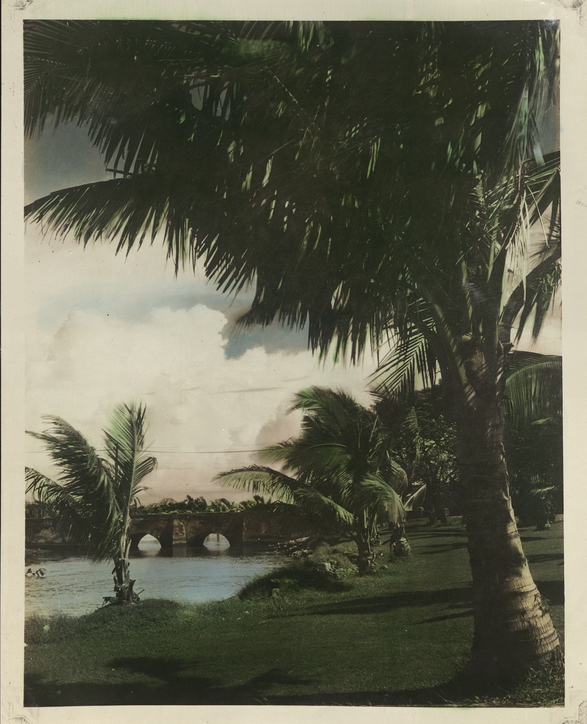 [Untitled – Park, river, and old stone bridge – Legaspi City?].