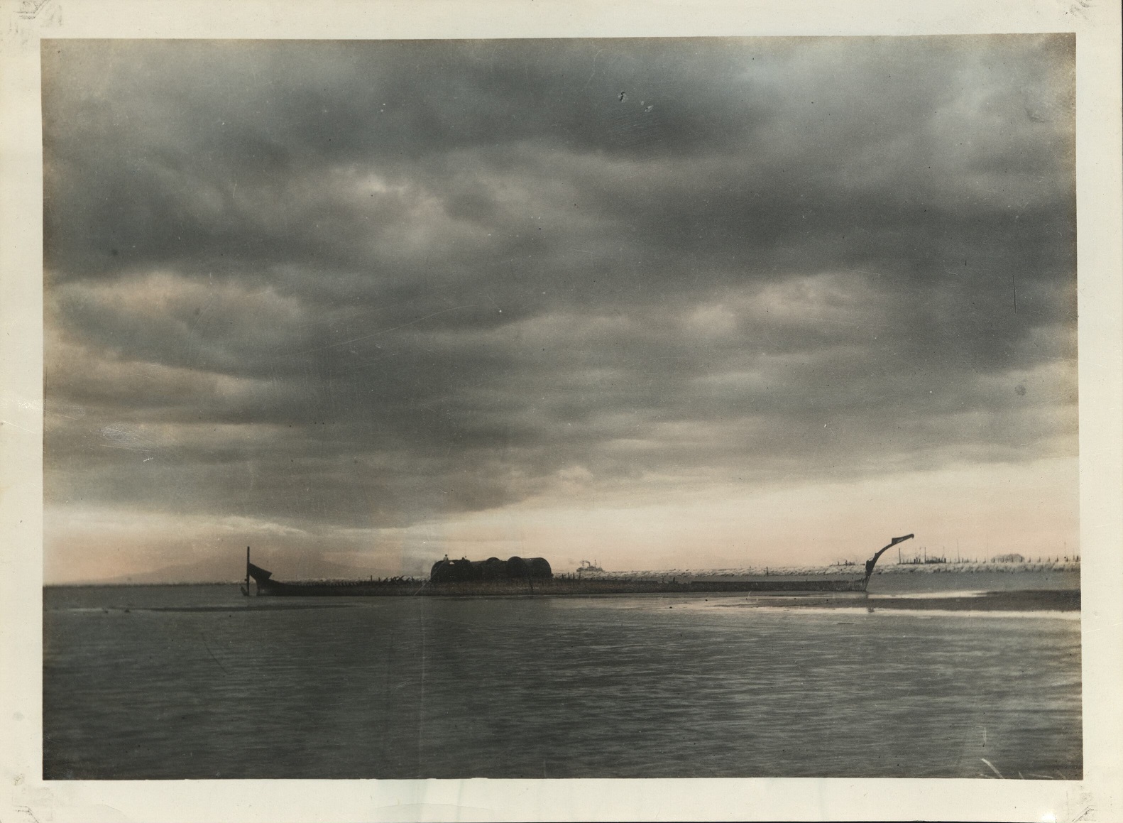 [Untitled – Fishing huts on a sunken Spanish warship in Manila Bay.].