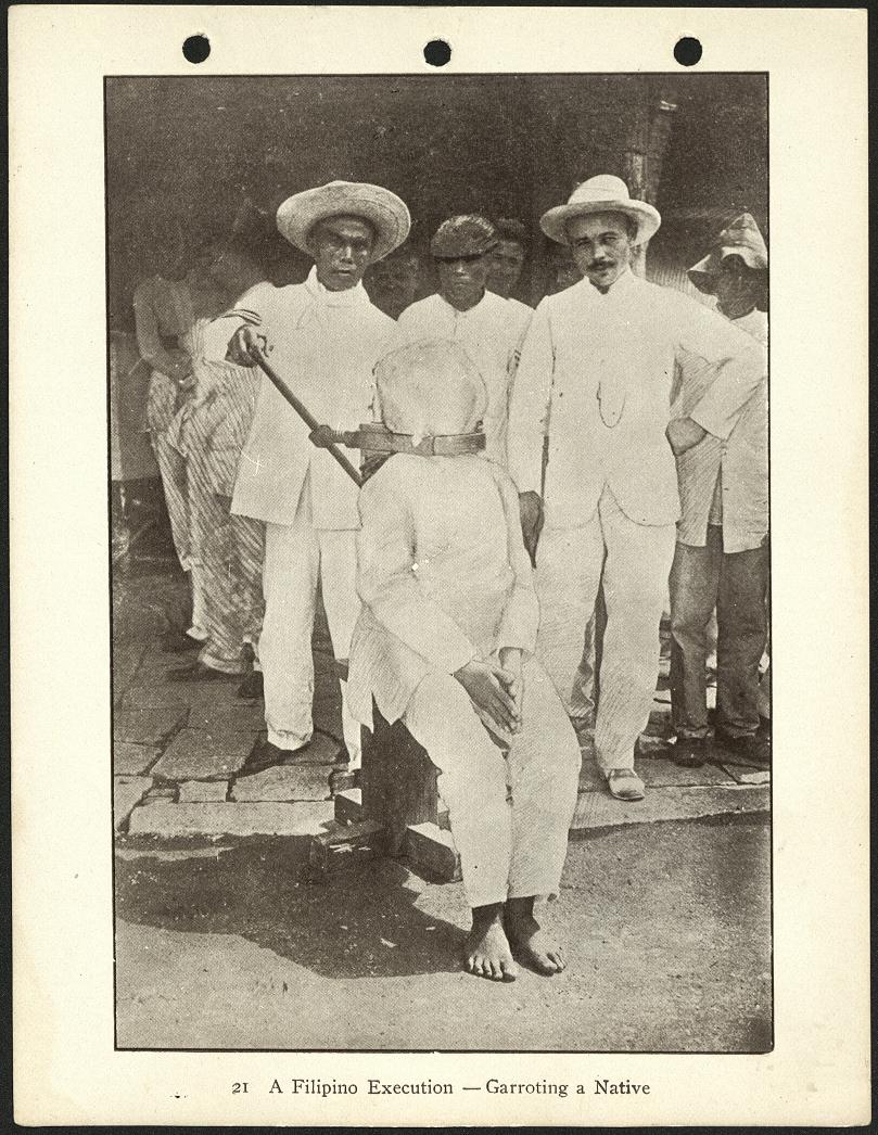 21. A Filipino execution – garroting a native.
