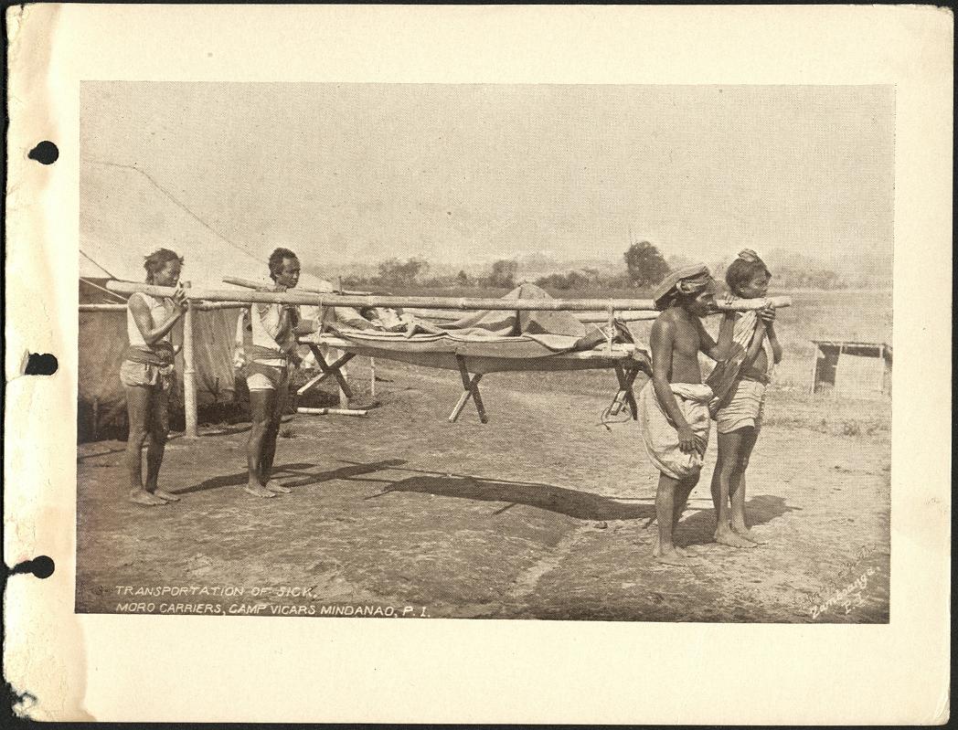 Transportation of sick. Moro carriers, Camp Vicars Mindanao, P. I.
