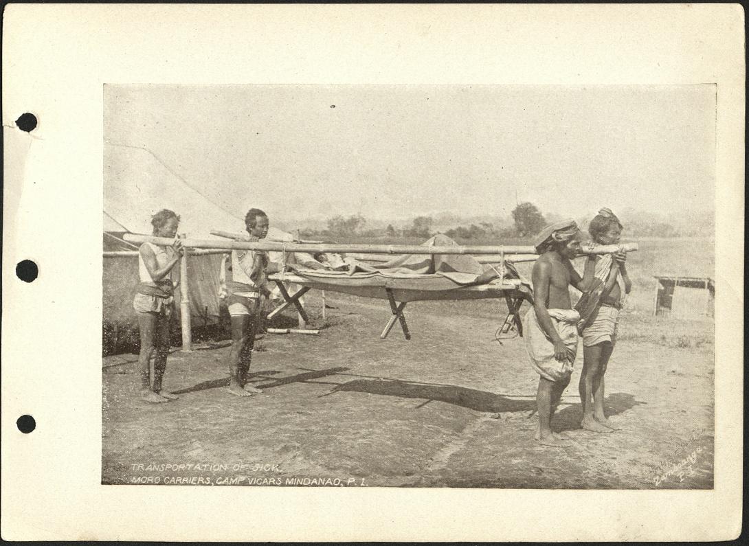 Transportation of sick. Moro carriers, Camp Vicars Mindanao, P. I.