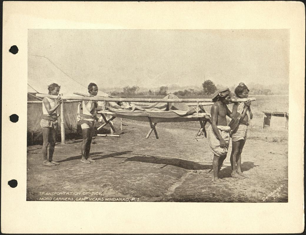 Transportation of sick. Moro carriers, Camp Vicars Mindanao, P. I.