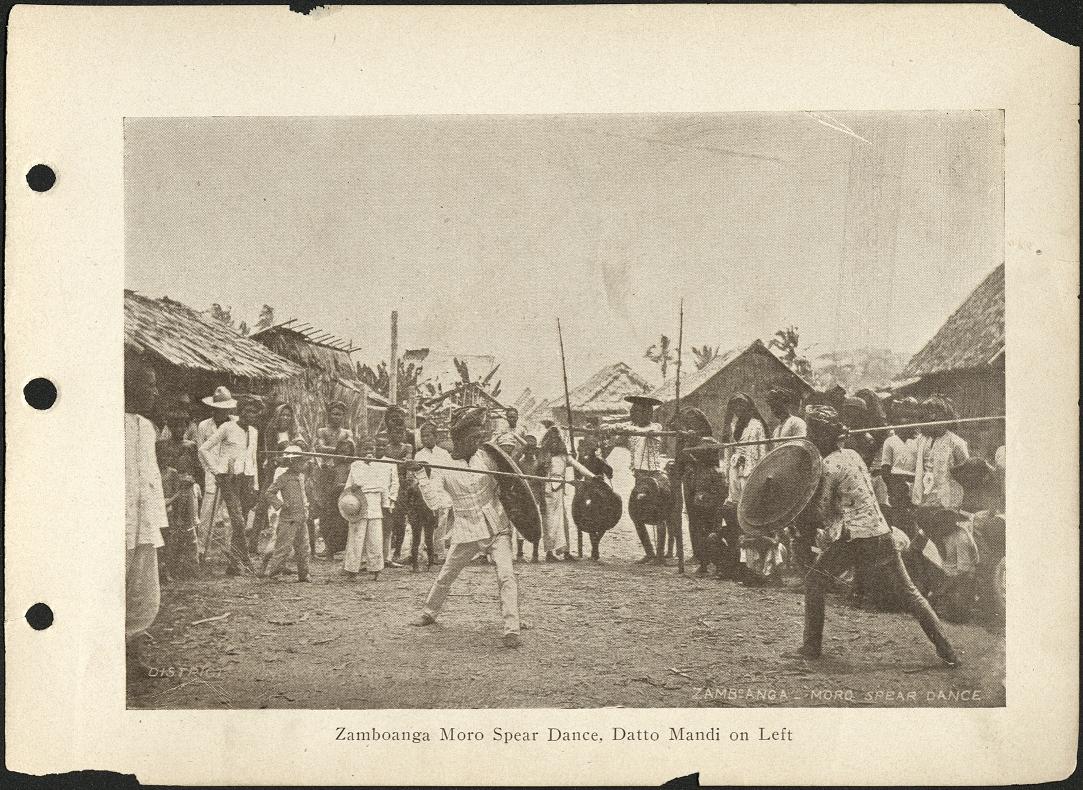 Zamboanga Moro spear dance, Datto Mandi on left.