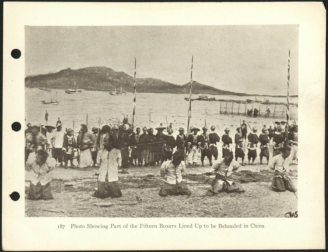 187. Photo showing part of the fifteen Boxers lined up to be beheaded in China.