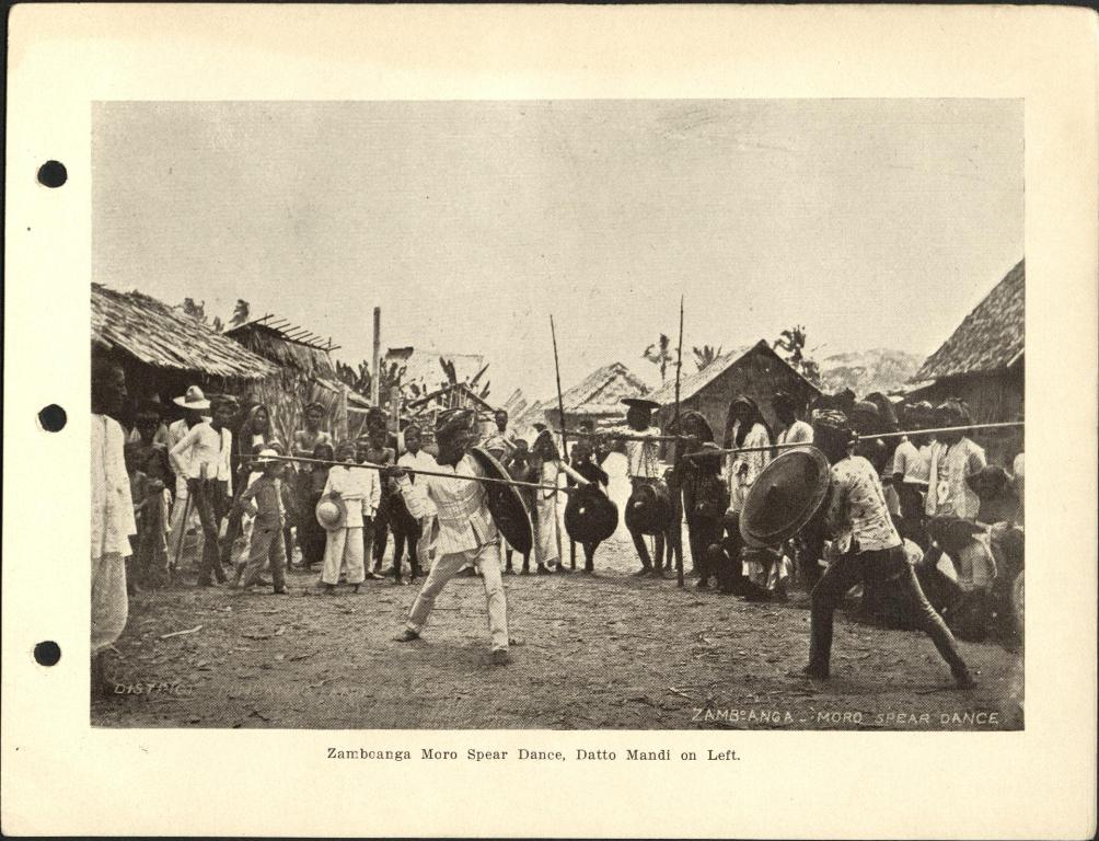 Zamboanga Moro spear dance. Datto Mandi on left.