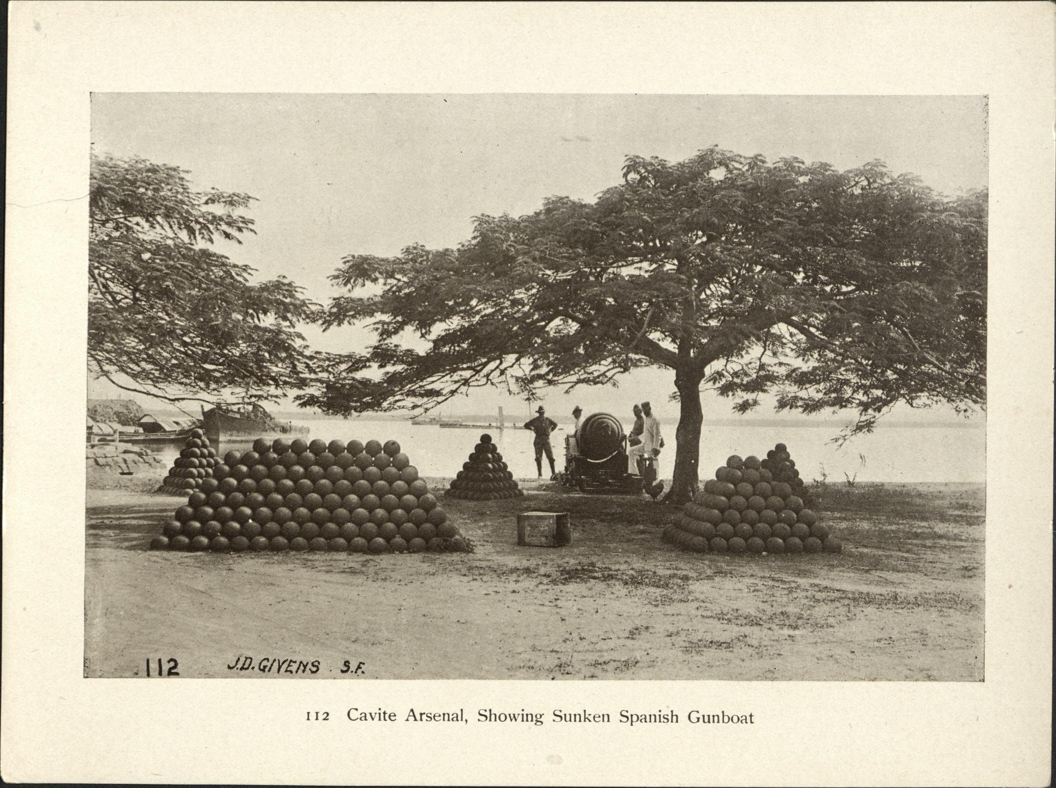 112. Cavite Arsenal, showing sunken Spanish gunboat [the cruiser Don Antonio de Ulloa].