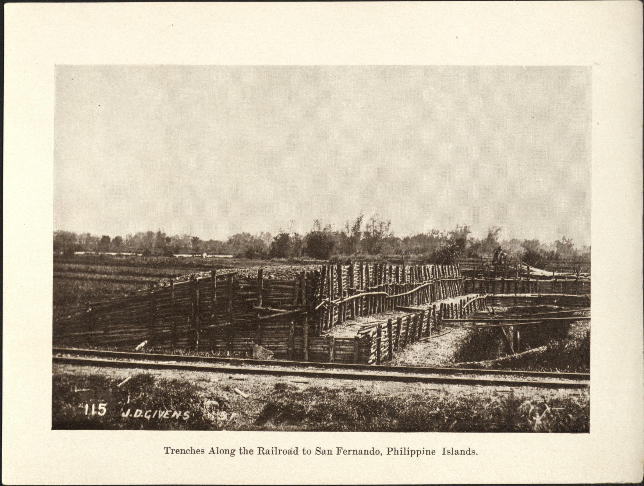 115. Trenches along the railroad to San Fernando, Philippine Islands.