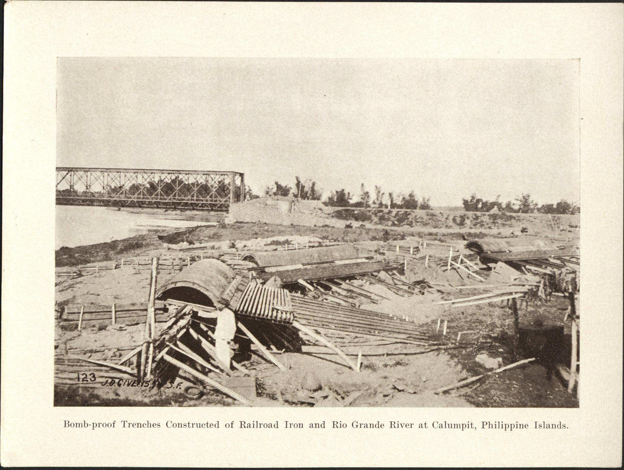 123. Bomb-proof trenches constructed of railroad iron and Rio Grande River at Calumpit, Philippine Islands.