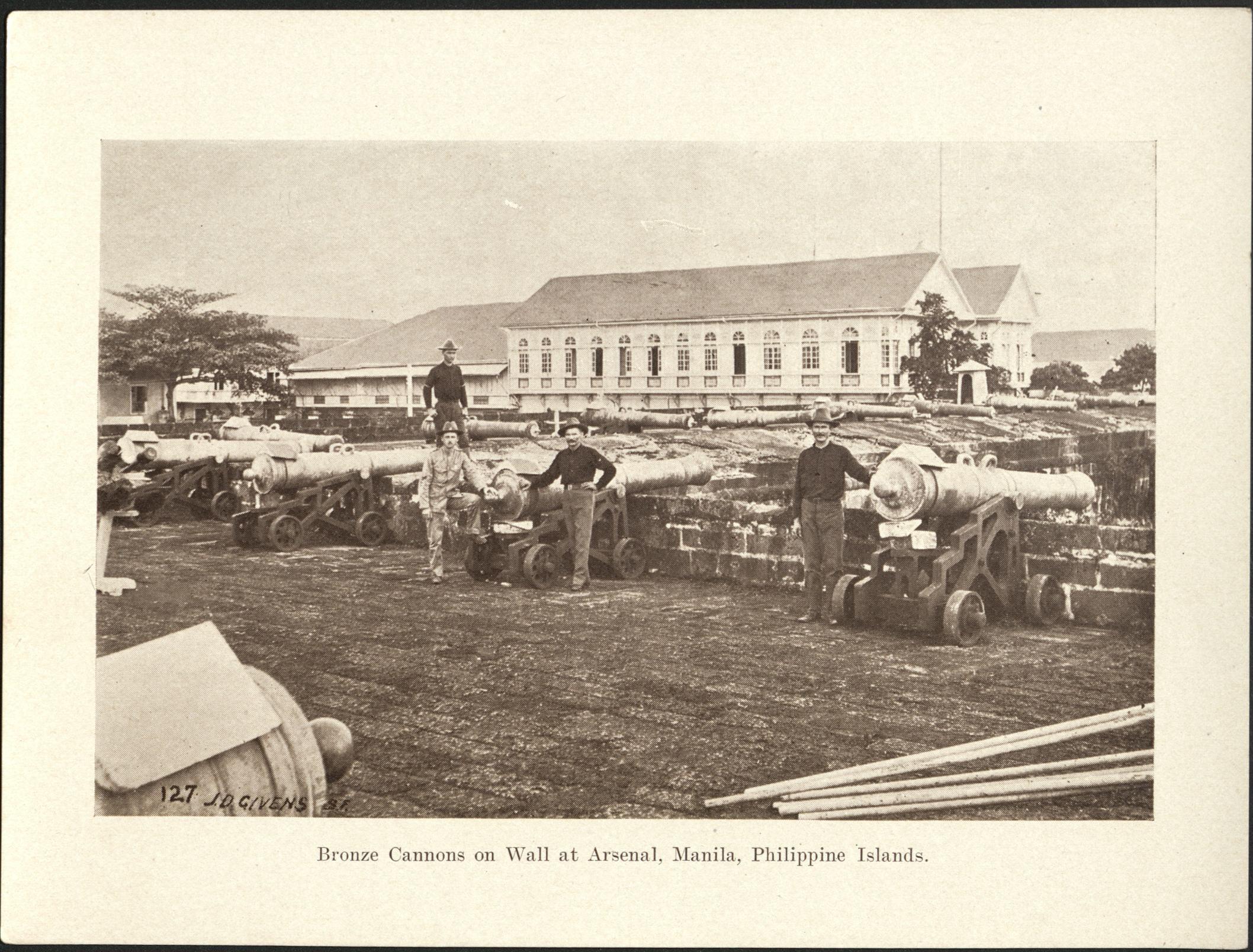 127. Bronze cannons on wall at arsenal, Manila, Philippine Islands.