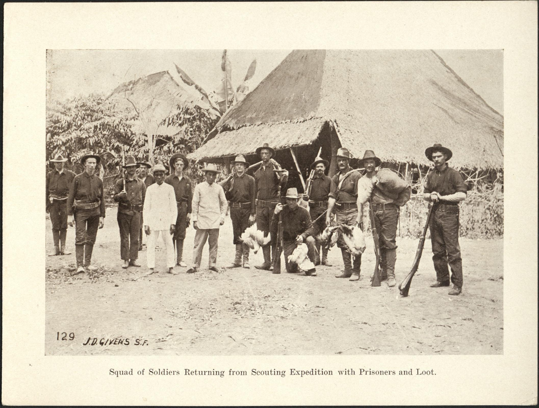 129. Squad of soldiers returning from scouting expedition with prisoners and loot.