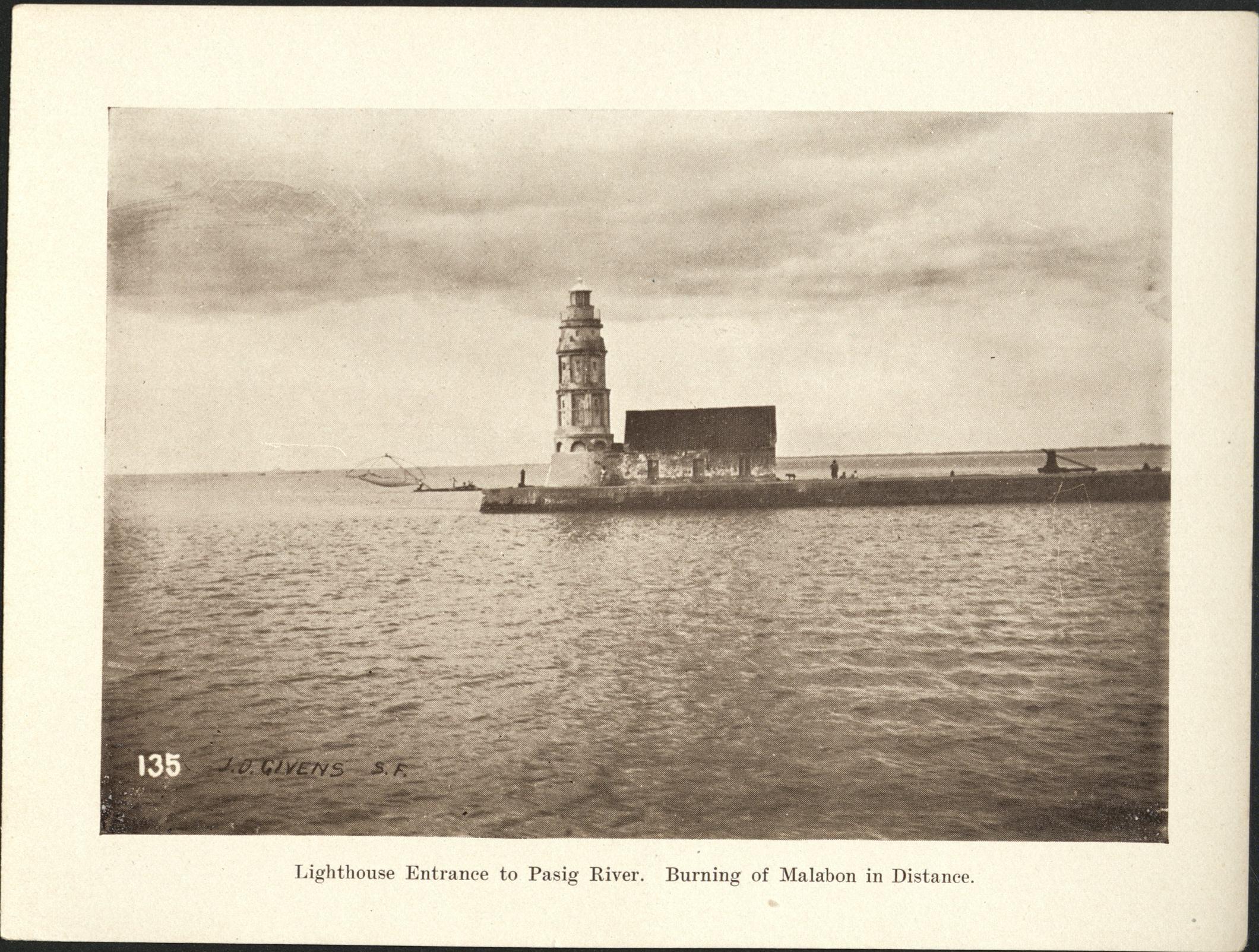 135. Lighthouse, entrance to Pasig River. Burning of Malabon in distance.