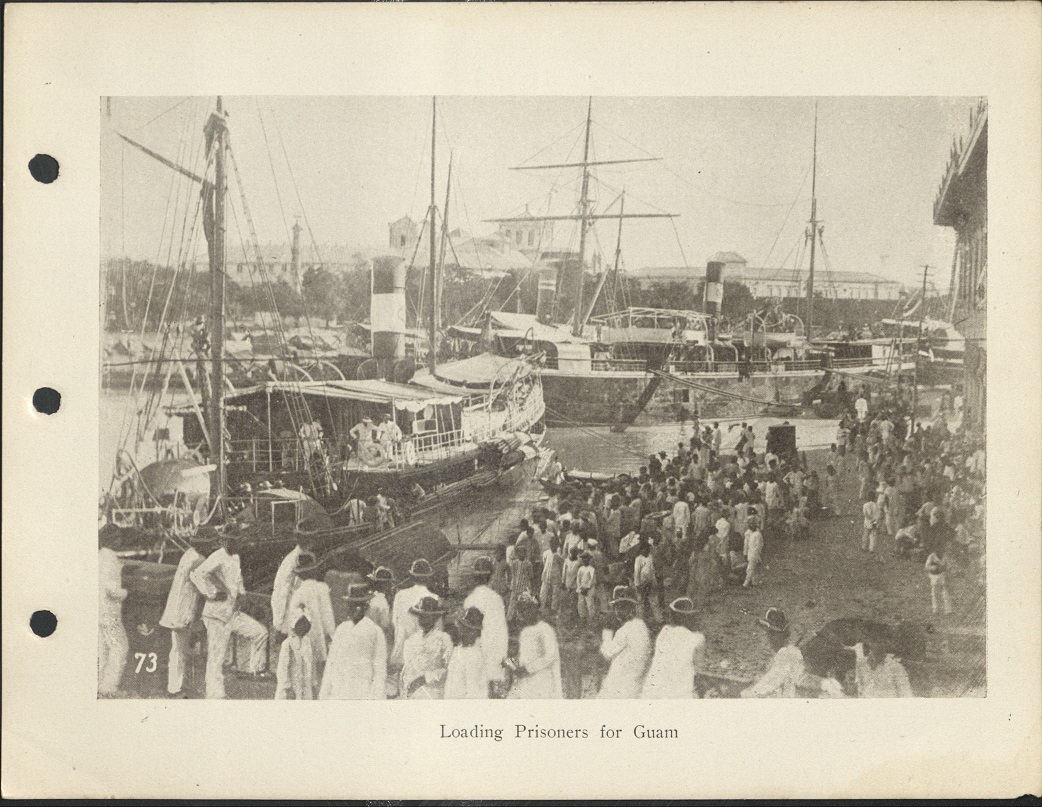 73. Loading prisoners for Guam.