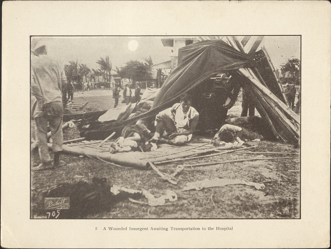 3. A wounded insurgent awaiting transportation to the hospital.