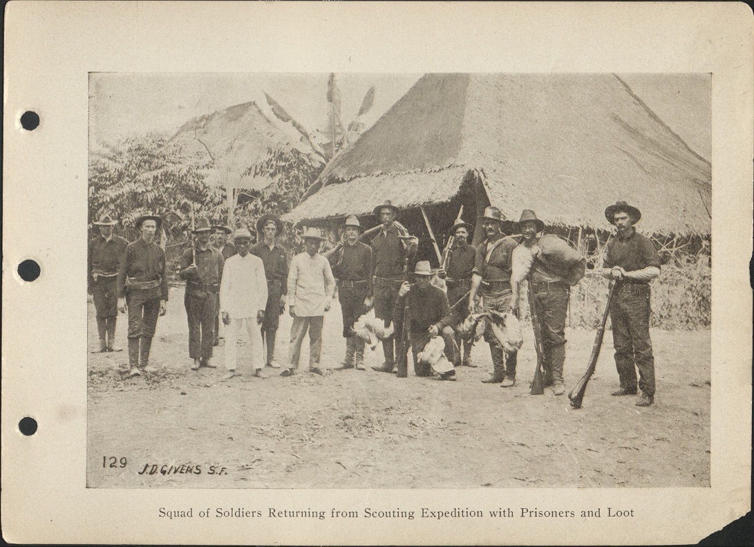 129. Squad of soldiers returning from scouting expedition with prisoners and loot.