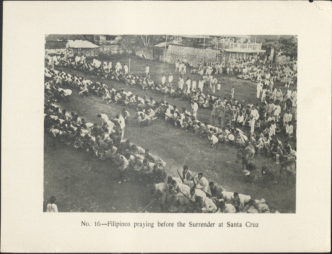 No. 16 – Filipinos praying before the surrender at Santa Cruz.