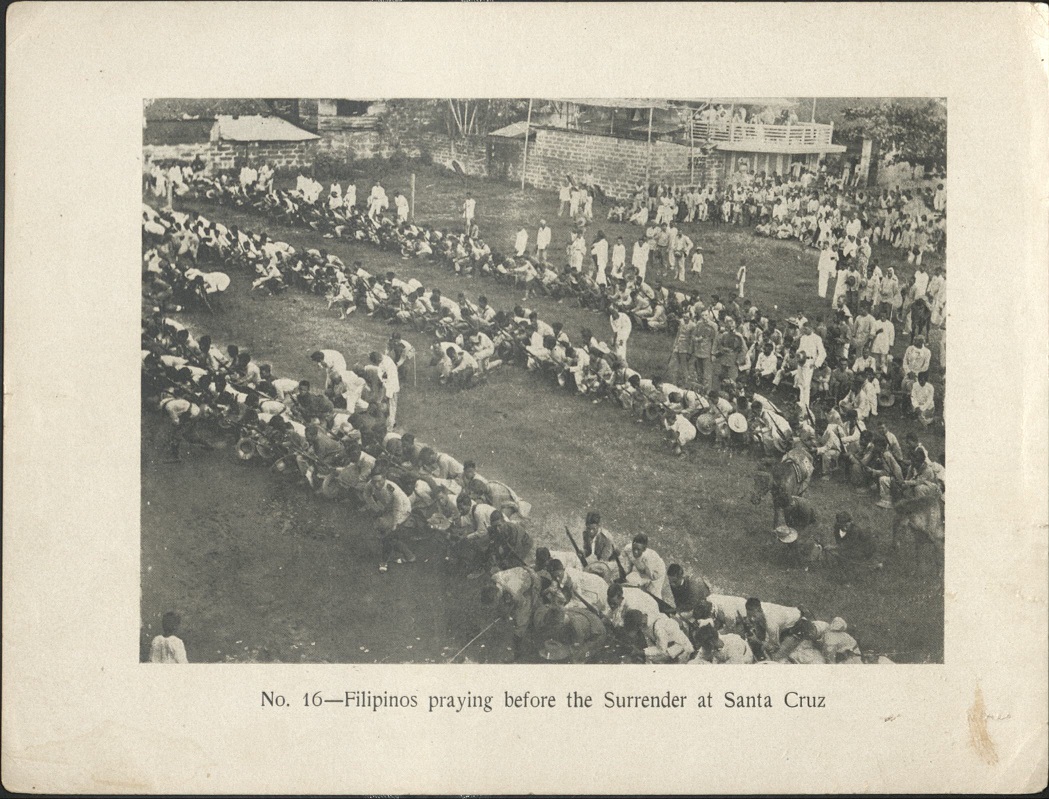 No. 16 – Filipinos praying before the surrender at Santa Cruz.