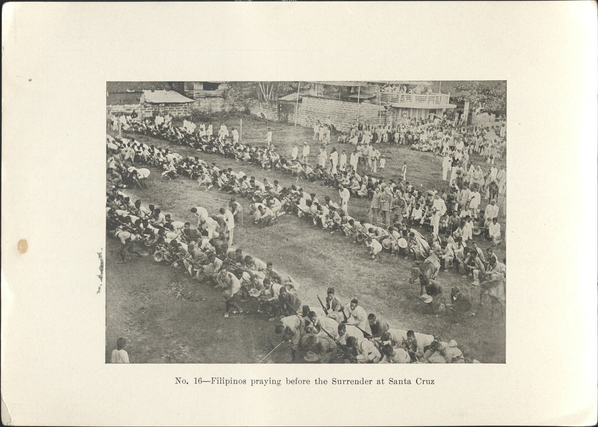 No. 16 – Filipinos praying before the surrender at Santa Cruz.