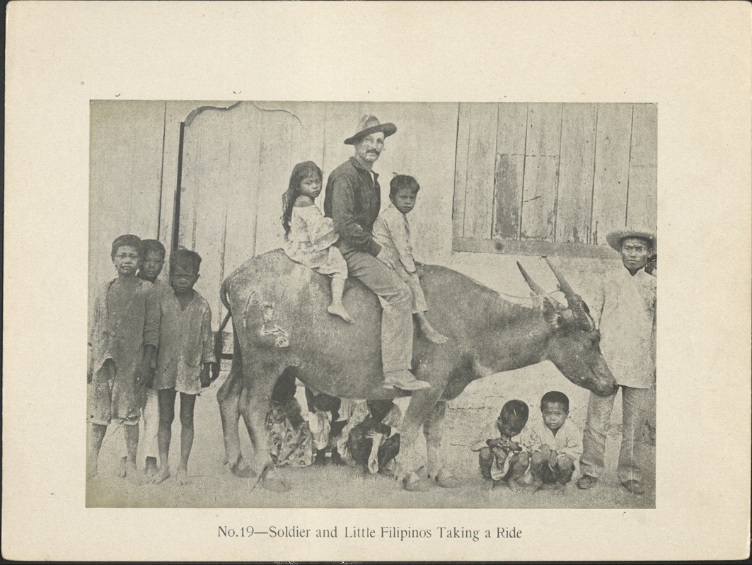 No. 19 – Soldier and little Filipinos taking a ride.