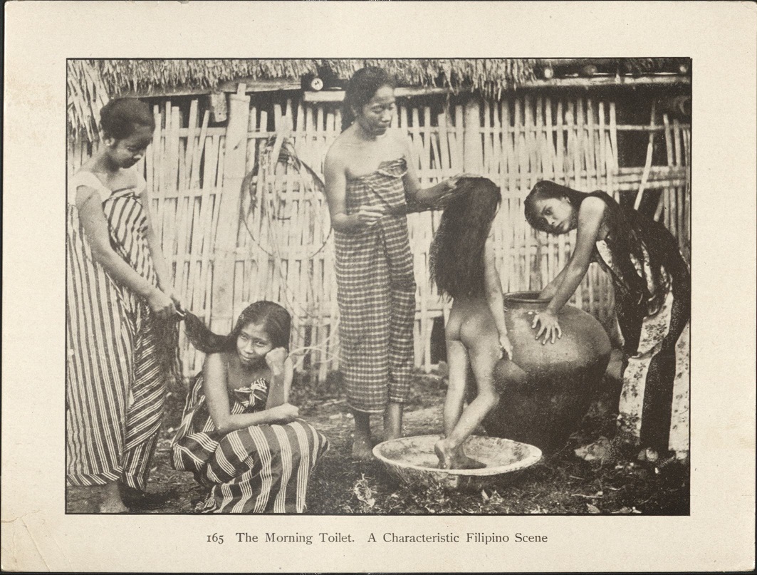 165. The morning toilet. A characteristic Filipino scene.