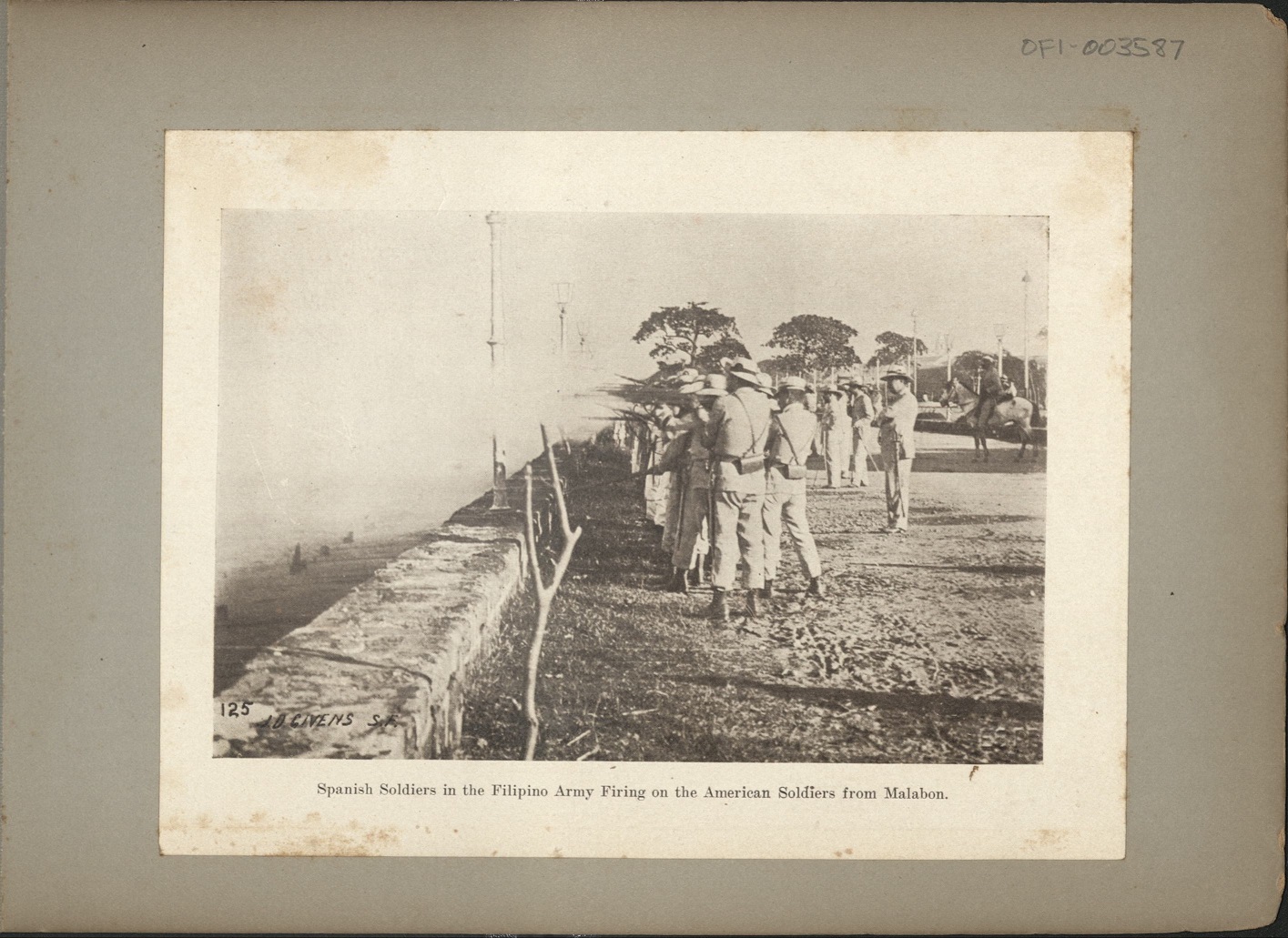 125. Spanish soldiers in the Filipino Army firing on the American soldiers from Malabon.