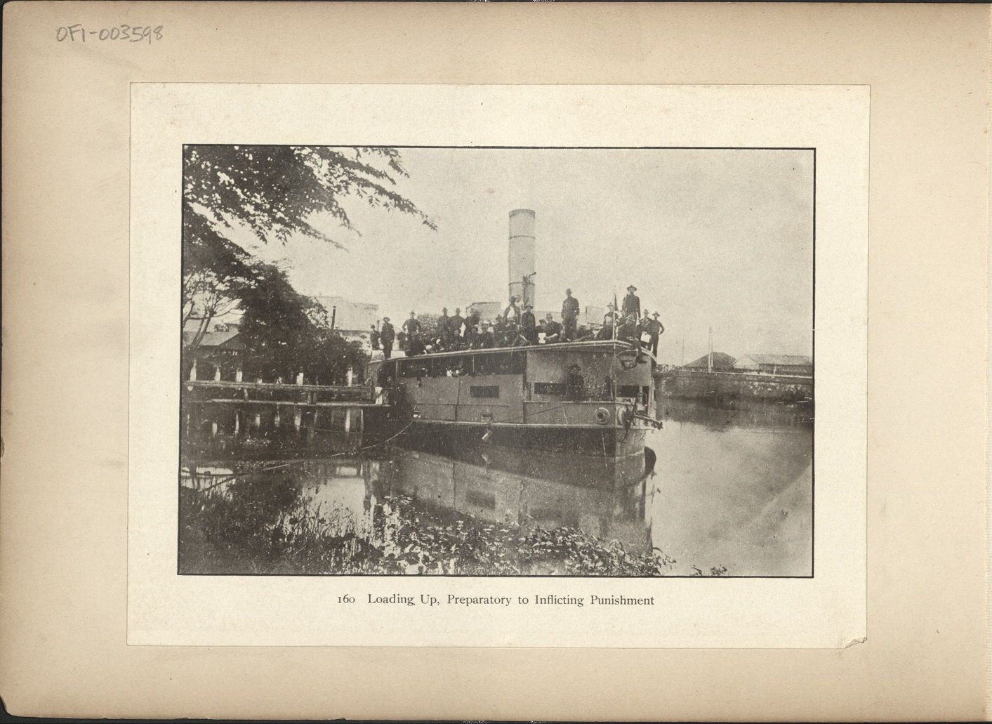 160. Loading up, preparatory to inflicting punishment [Gunboat “Laguna de Bay”].