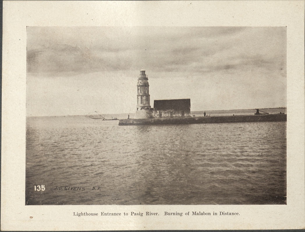 135. Lighthouse, entrance to Pasig River. Burning of Malabon in distance.