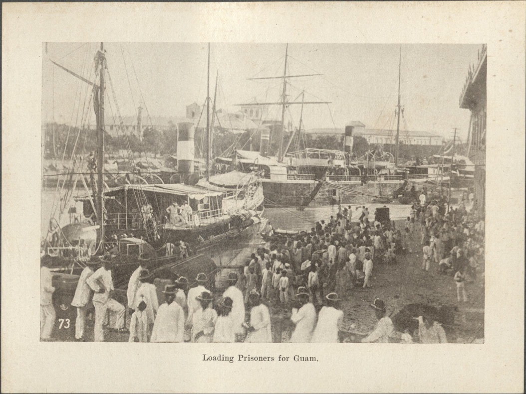 73. Loading prisoners for Guam.