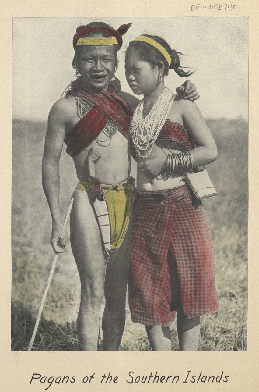 Pagans of the Southern Islands [Dressed for a holiday, a Mangyan couple visits the flying field].