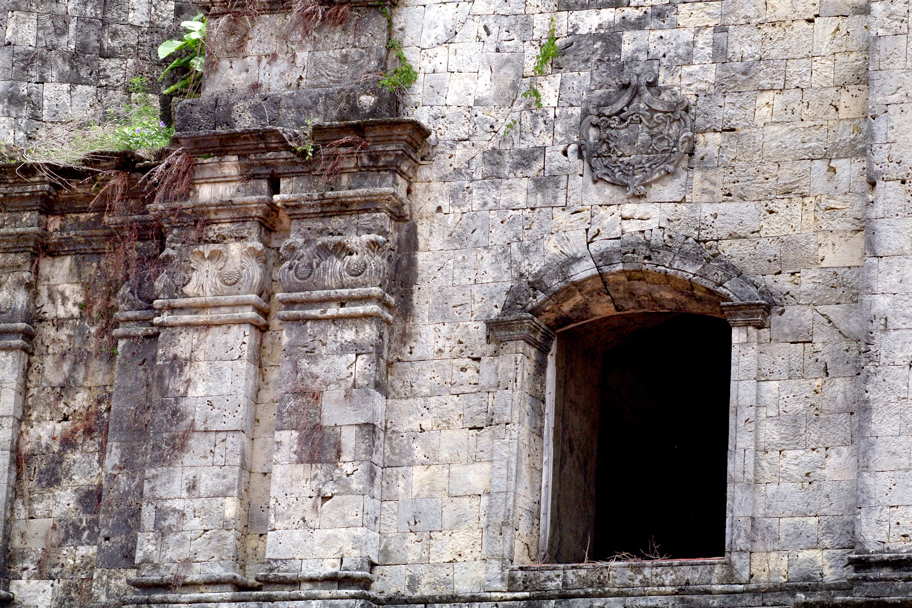 Panay Church, Capiz, Panay – window and detail of stone carving.