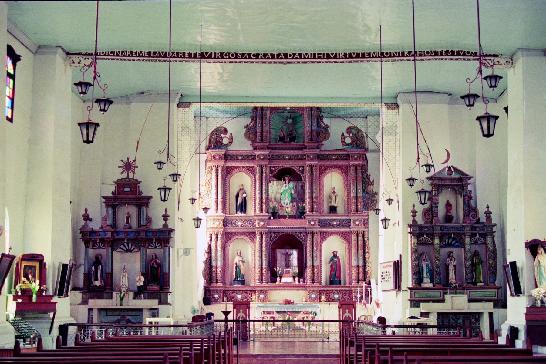Maragondon Church, Cavite – interior view of altar and retables.