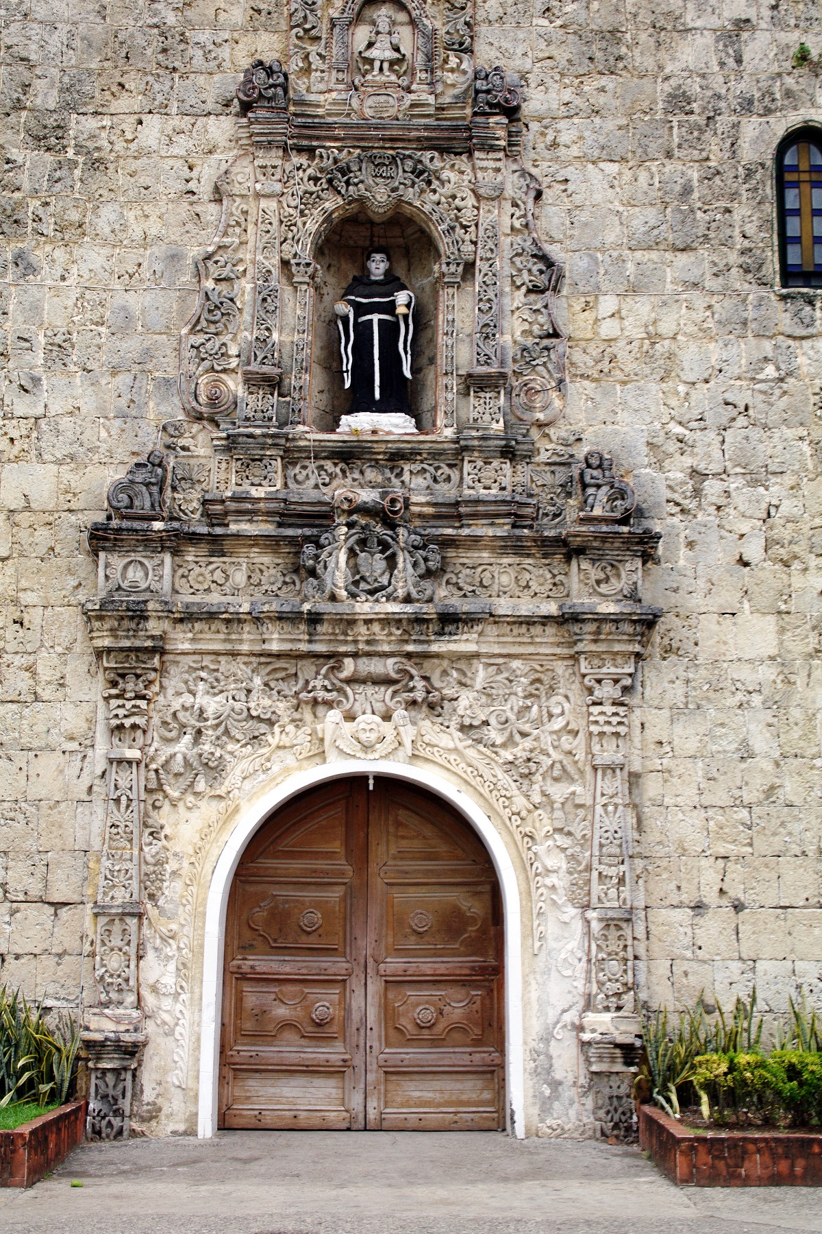 Tigbauan Church, Iloilo, Panay Island — doorway and facade detail.