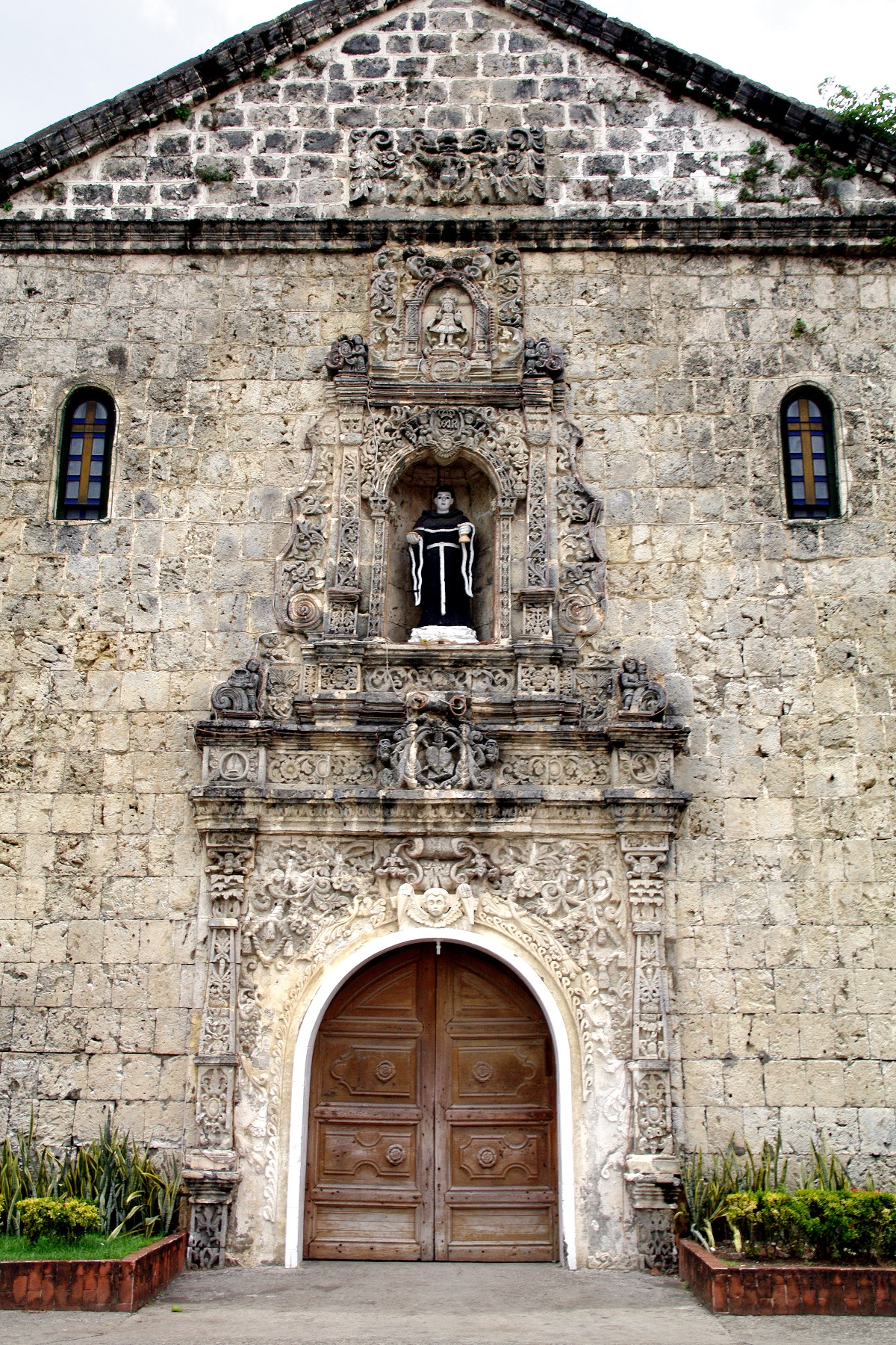 Tigbauan Church, Iloilo, Panay Island — doorway and facade detail.