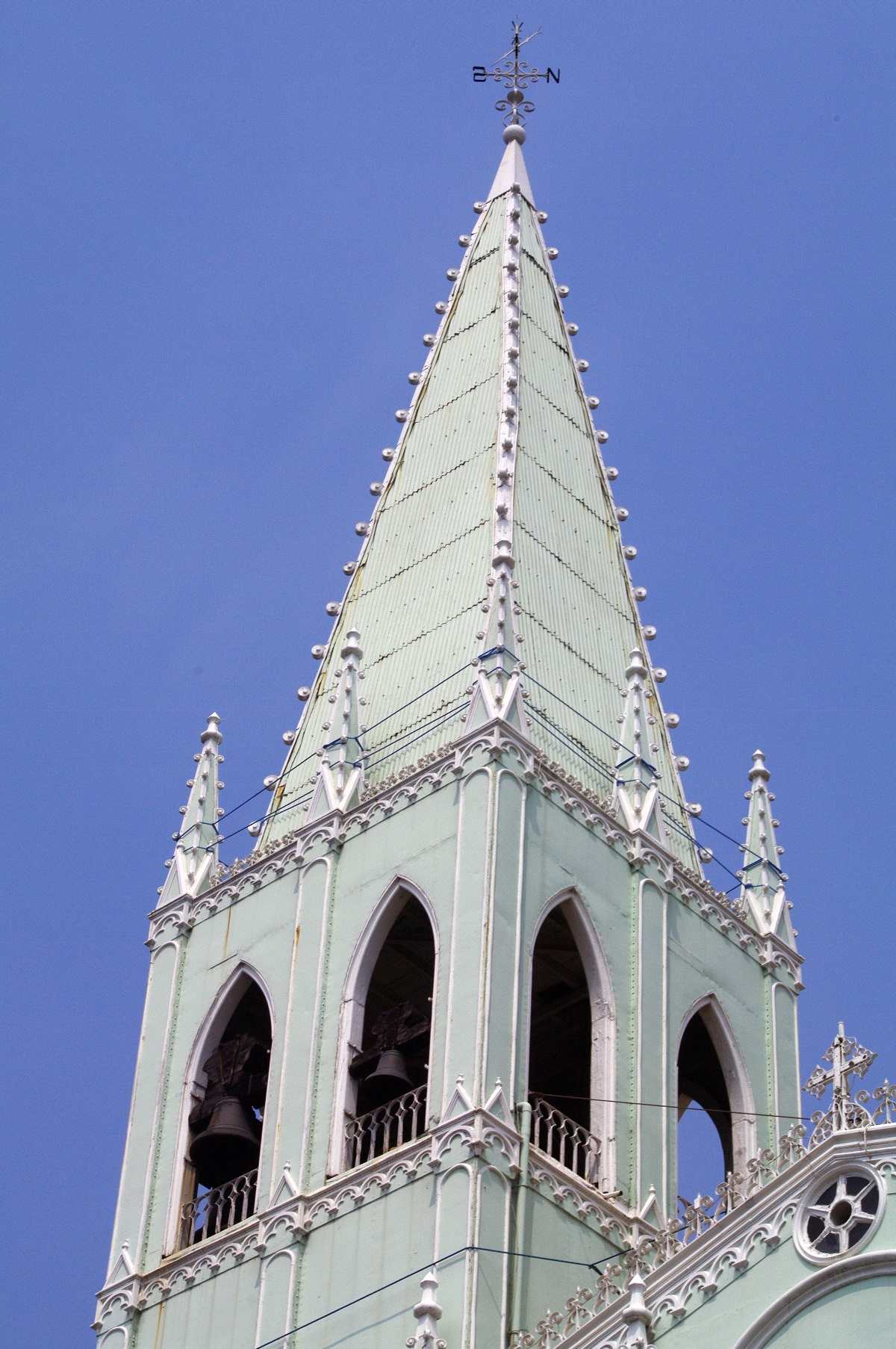 San Sebastian Church, Manila — bell tower spire detail.