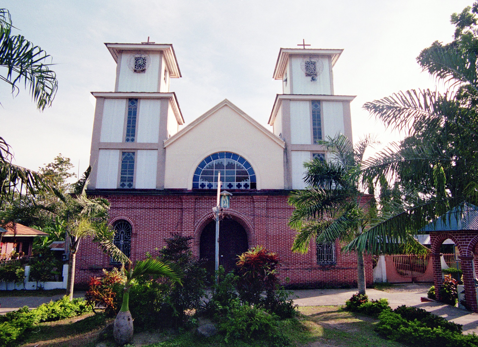 Immaculate Conception Church, Jasaan, Misamis Oriental – facade and bell towers.