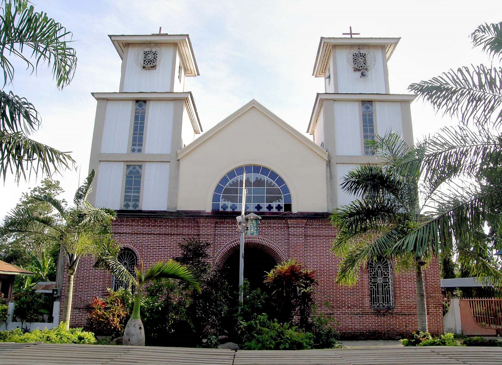 Immaculate Conception Church, Jasaan, Misamis Oriental – facade and bell towers.