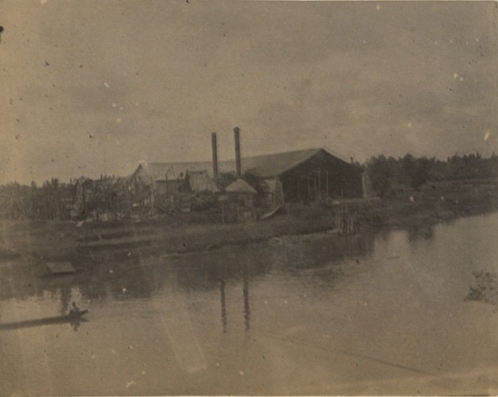 [Untitled – Mill or factory by a river].