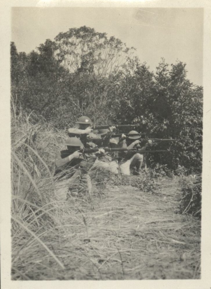 Taken on maneuvers in March 1933. One with white on helmet is yours truly.