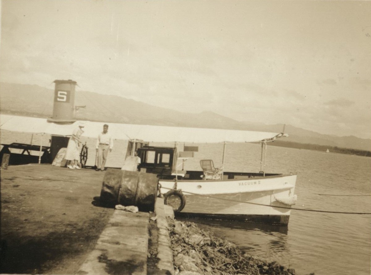 [Untitled – Passenger boat, “Vacuum II” at pier.