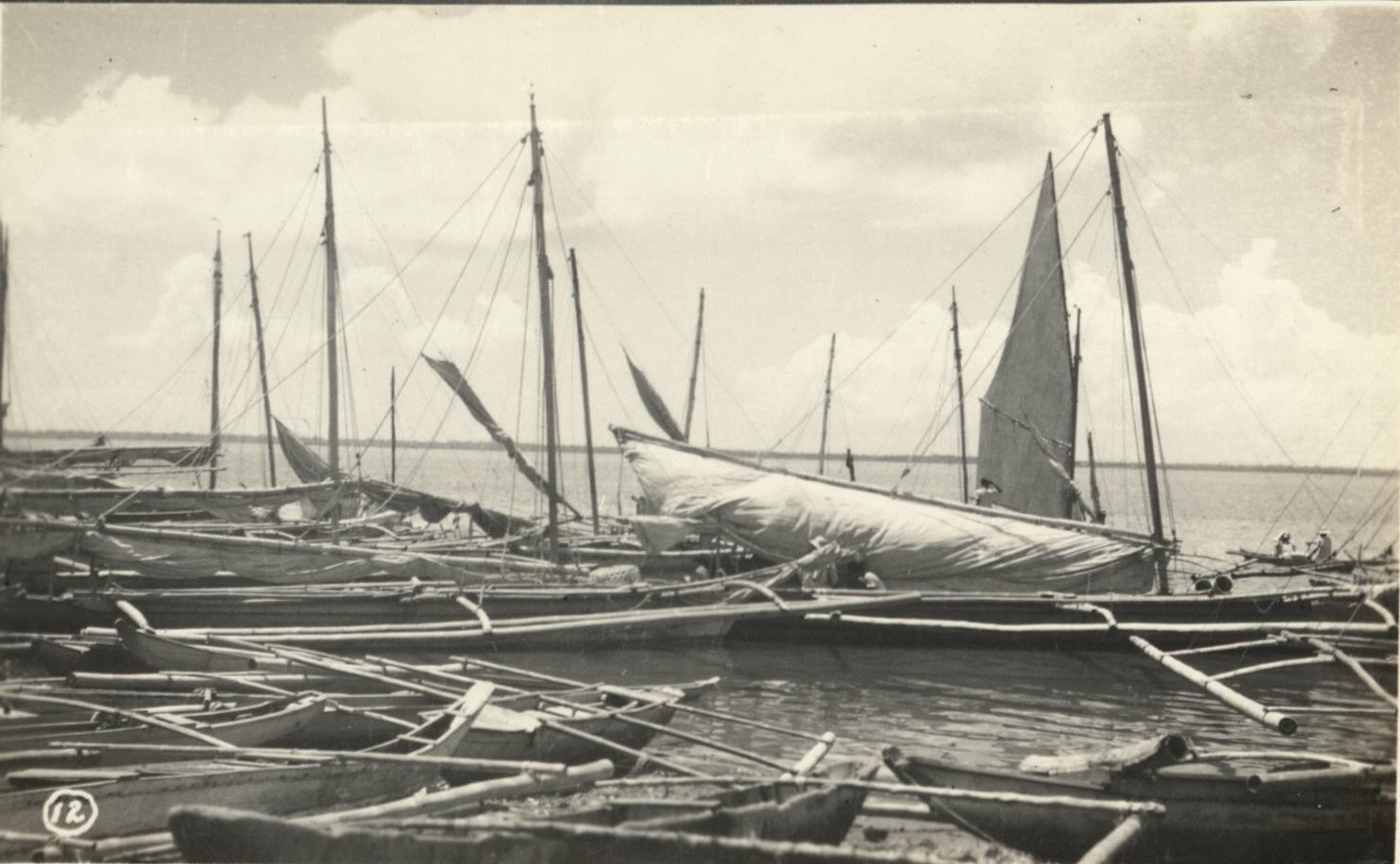 [Untitled – Fishing boats in harbor].