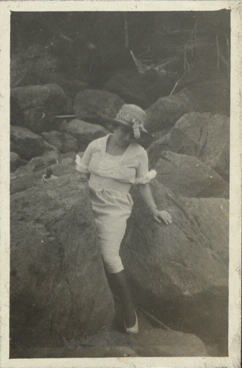 Untitled [Woman squeezing through boulders, Fort Wint, Grande Island, Subic Bay].