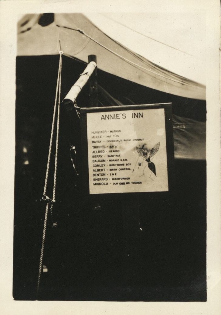 Seen around the 29th [Engineer Base Topographic Battalion. Sign outside barracks: “Annie’s Inn”].