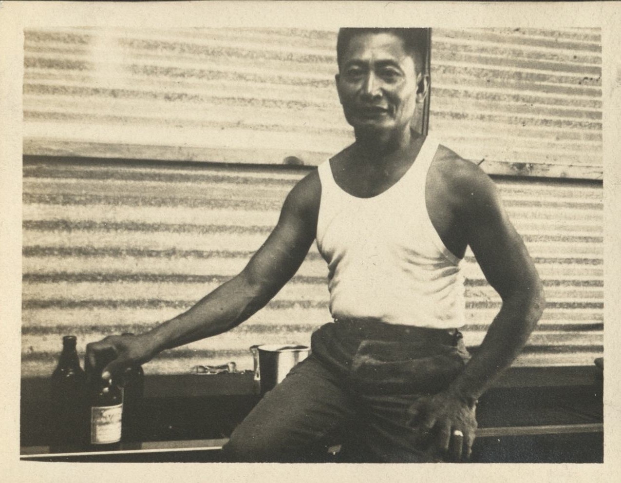 Seen around the 29th [Engineer Base Topographic Battalion. Man drinking beer].