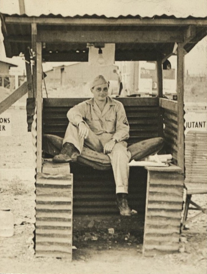 Seen around the 29th [Engineer Base Topographic Battalion. Soldier in guard shack].