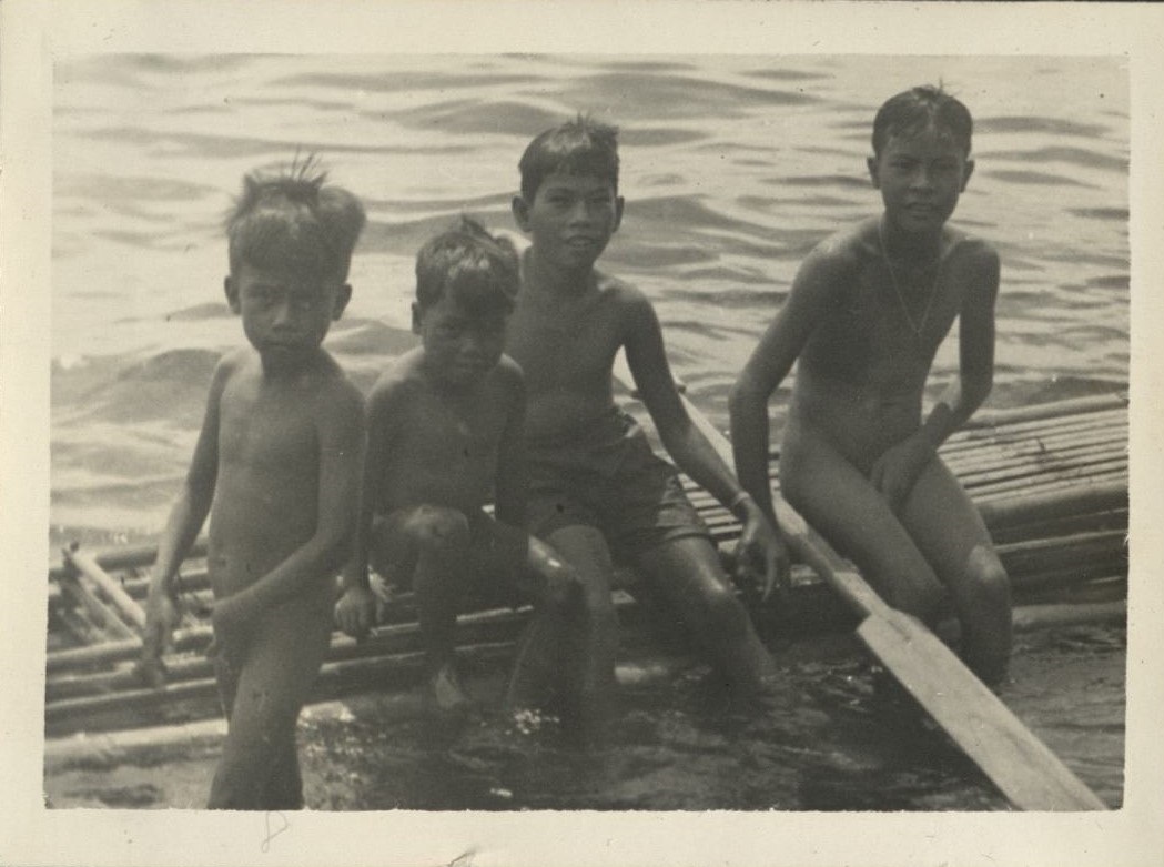 [Untitled – Four Filipino boys bathing or swimming in a river].