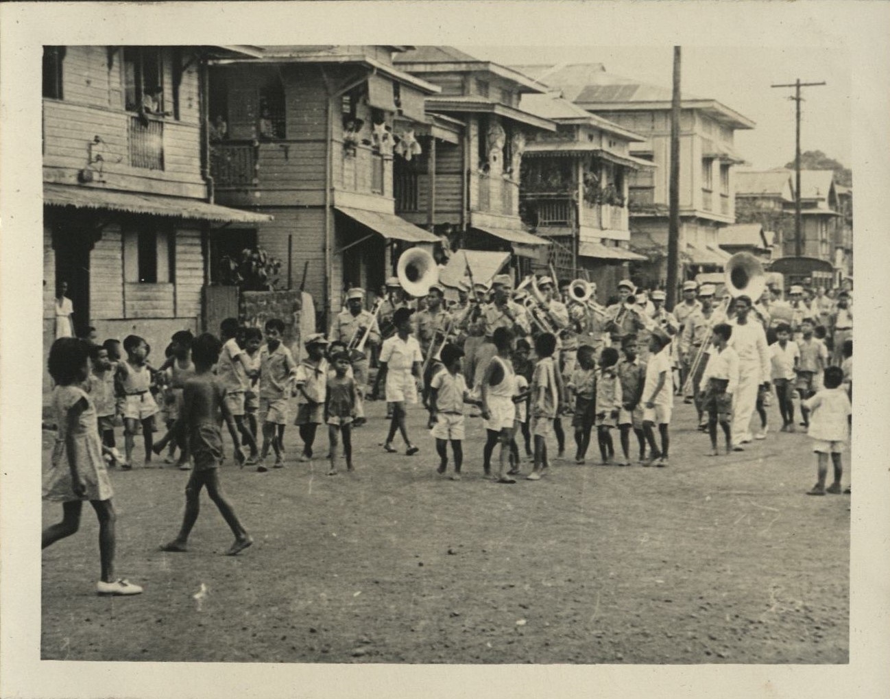 [Untitled – Parade through a Philippine street].