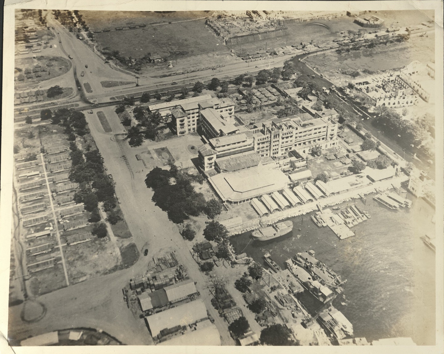 [Untitled – Aerial view of Manila Hotel, war-damaged.. Reversed negative].