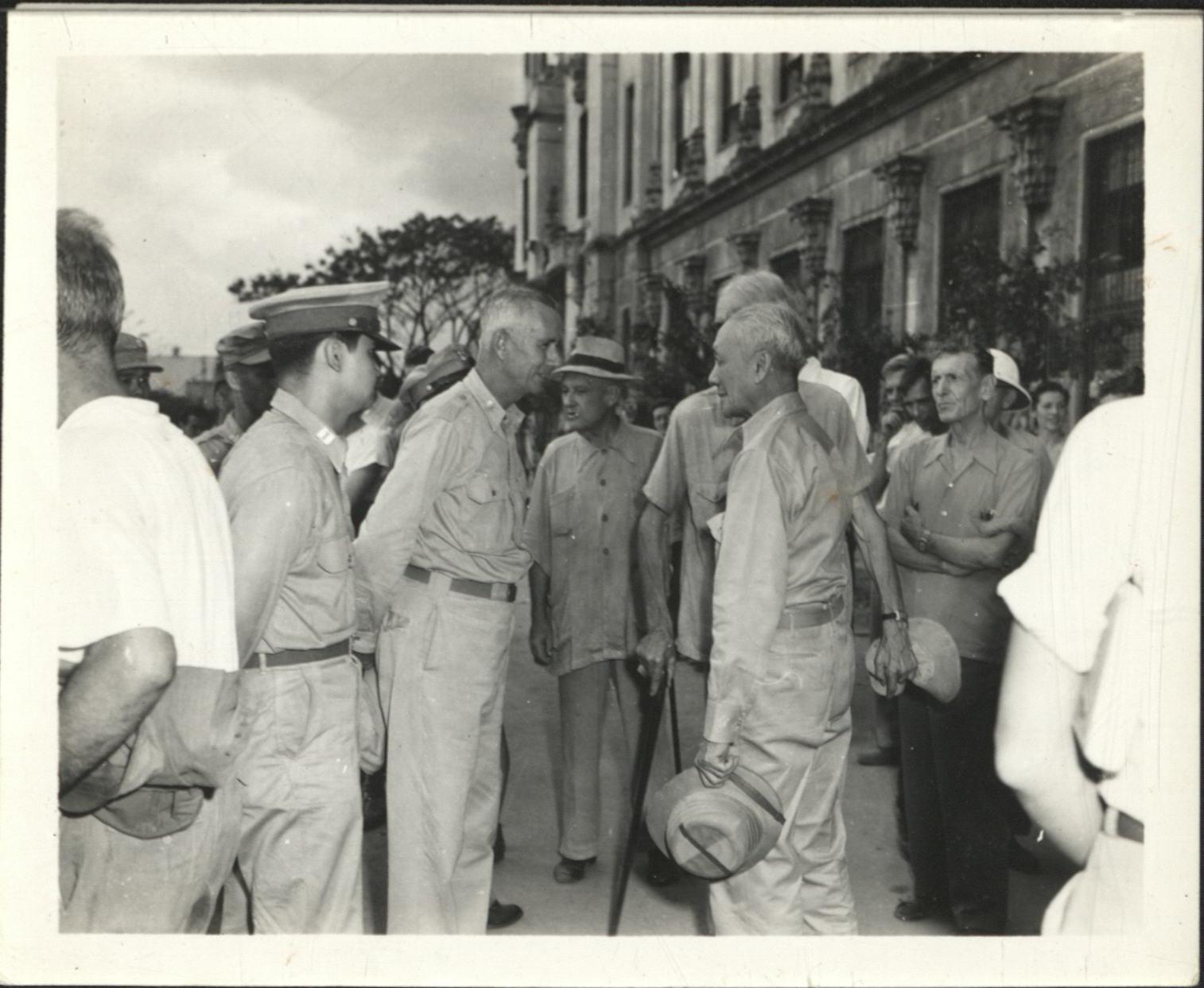 [Untitled – Philippine president Sergio Osmena greets freed detainees, Santo Tomas Internment Camp].