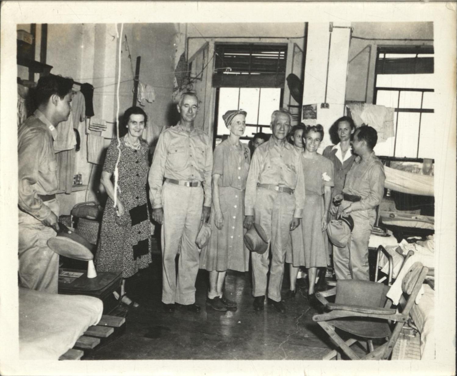 [Untitled – Philippine president Sergio Osmena greets freed detainees, tours Santo Tomas Internment Camp].